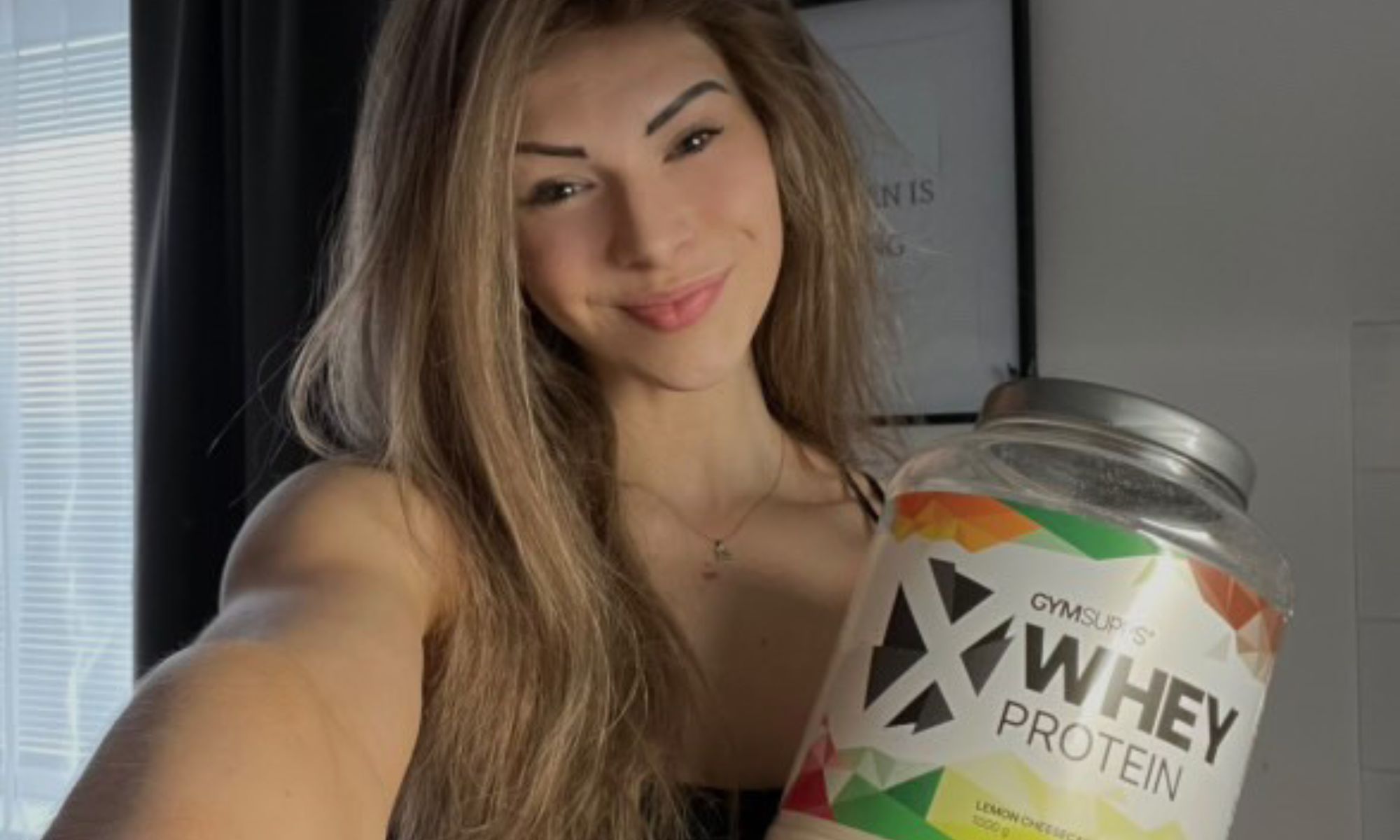 Žena drží Xwhey
